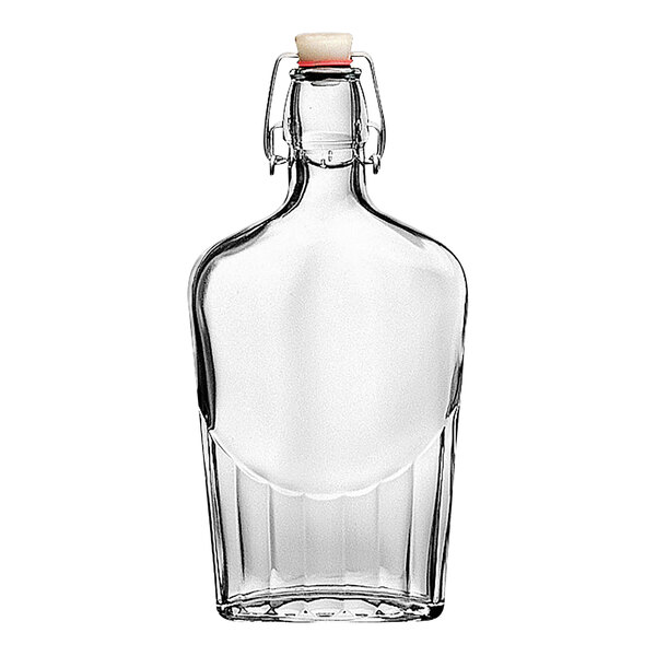 A Bormioli Rocco Swing clear glass flask with a stopper.