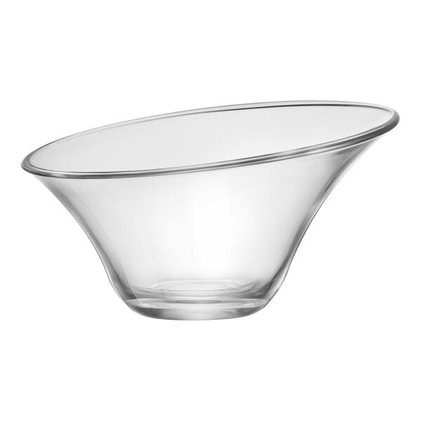 A clear glass bowl with a curved edge.