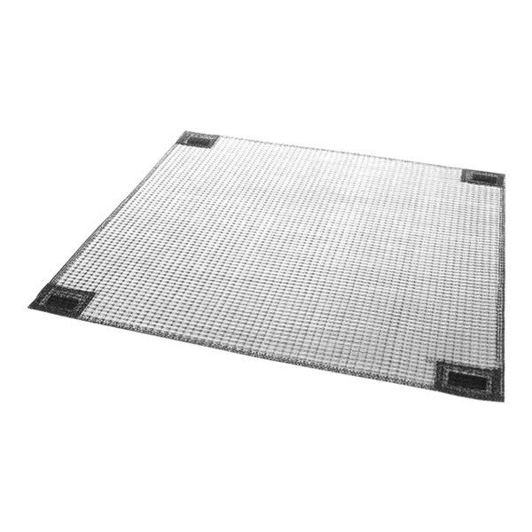 An Ice-O-Matic air intake filter with a white square mesh.