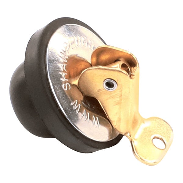 A close-up of a metal Vollrath drain plug with a gold and grey knob.