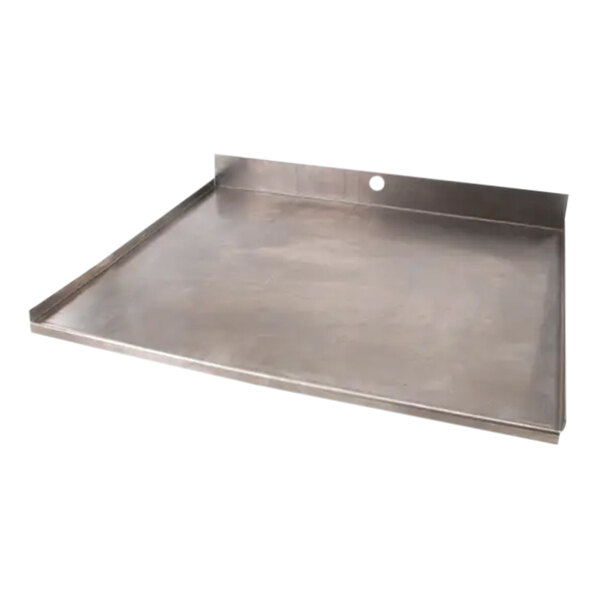 A stainless steel Garland / US Range oven broiler tray with a hole.