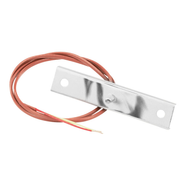 A metal piece with a red wire attached.