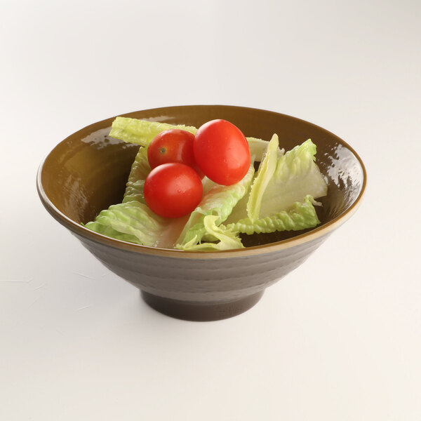 An Elite Global Solutions Tapenade-colored melamine bowl filled with salad, tomatoes, and lettuce.