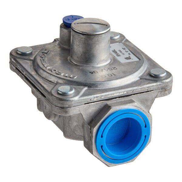 A metallic valve-like device with a square top, bolts at the corners, and a blue plastic cap on one end.