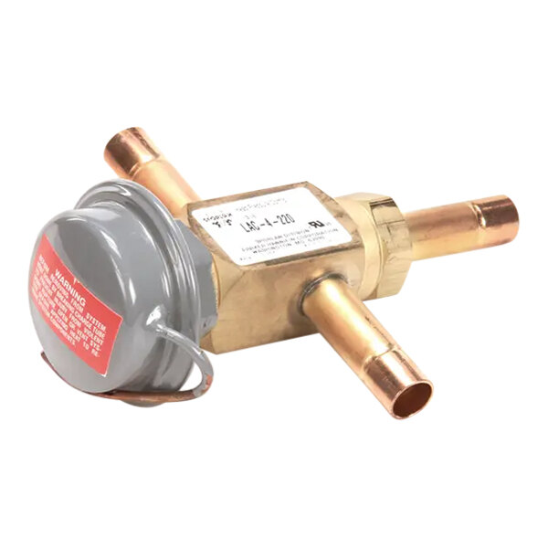 A close-up of a brass Ice-O-Matic valve head.