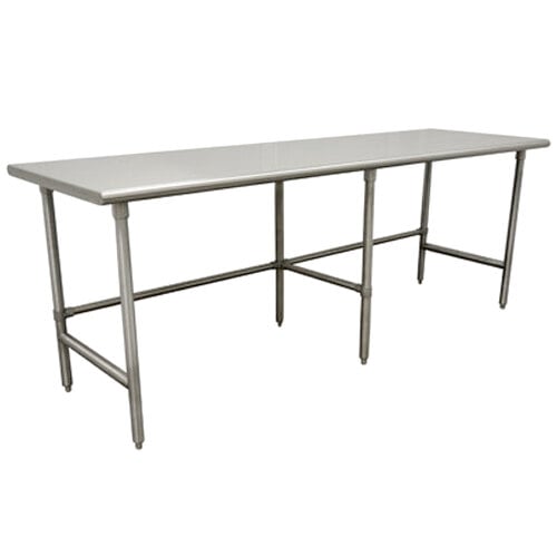 A stainless steel Advance Tabco work table with metal legs.
