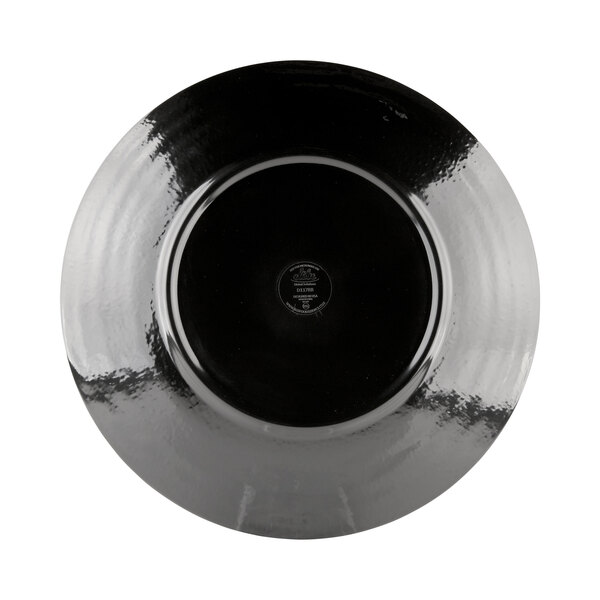 A close-up of a black Elite Global Solutions round plate with a silver rim.