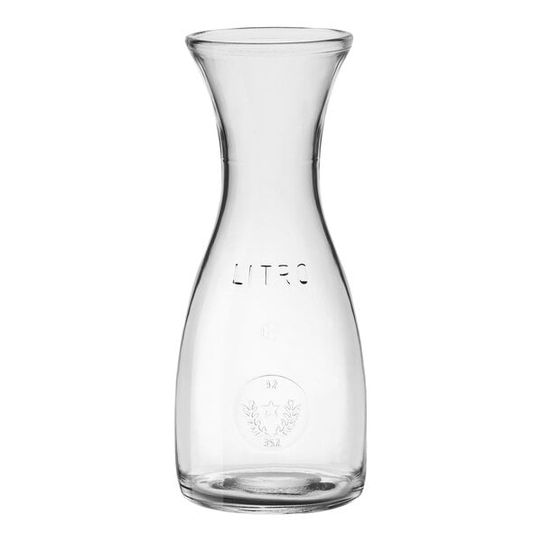 A clear glass Bormioli Rocco carafe with a logo on it.
