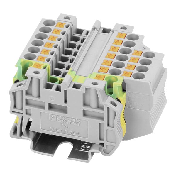 A grey Garland / US Range terminal block with yellow and green terminals.