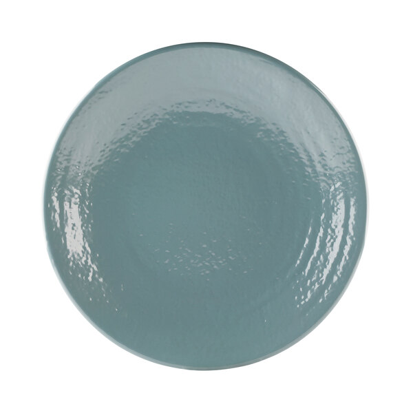 An Abyss blue melamine plate with a pebble design.
