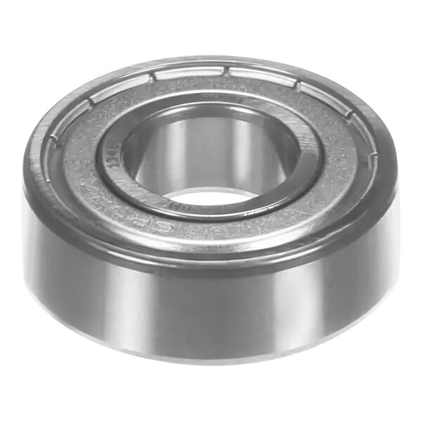 A round metal Anfim bearing with a hole in the middle