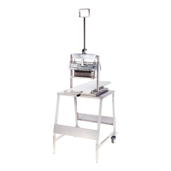 A metal and plastic meat tenderizer machine on a stand.