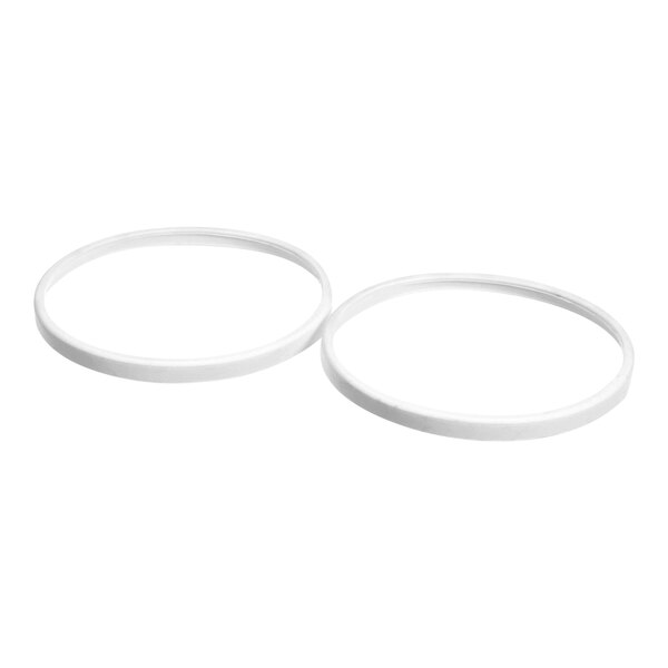 A close-up of a pair of white rubber rings.