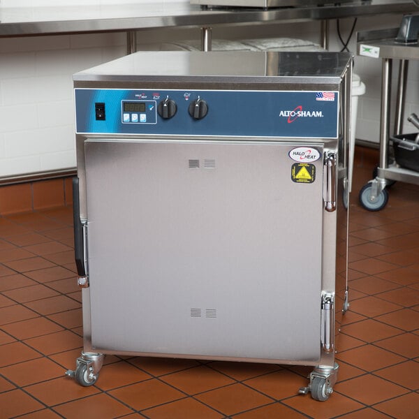 An Alto-Shaam undercounter cook and hold oven with a stainless steel top.