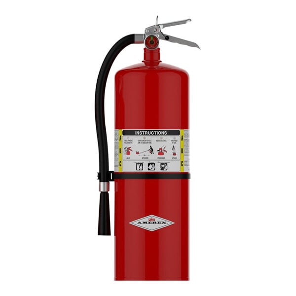 An Amerex red 20 lb. fire extinguisher with a black hose and instructions.