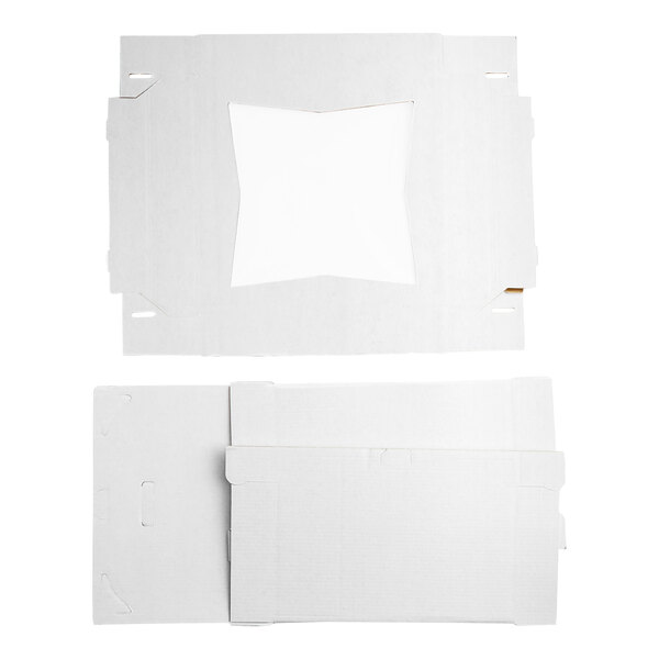 A white cardboard Southern Champion cake box with a square window cut out.