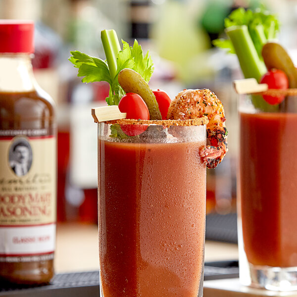 Two glasses of Demitri's Classic Bloody Marys on a table.