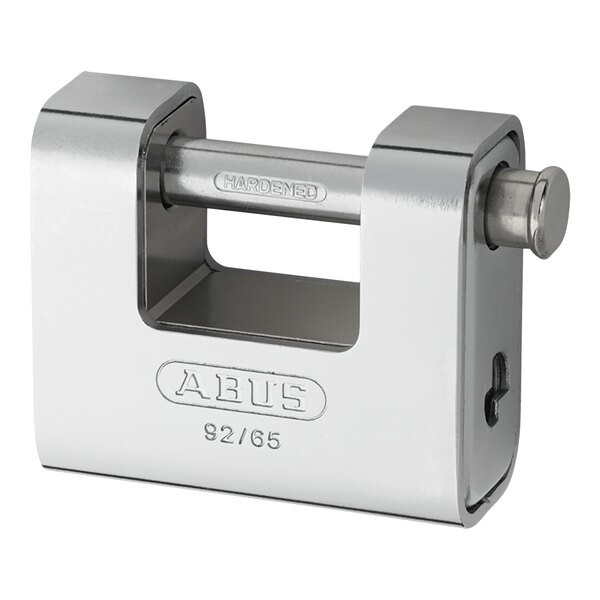 An ABUS brass padlock with a steel jacket and a keyhole.