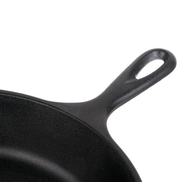 An Elite Global Solutions black faux cast iron fry pan with a handle.