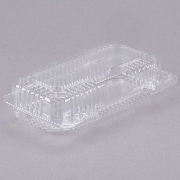 A Dart clear plastic oblong container with a hinged lid.