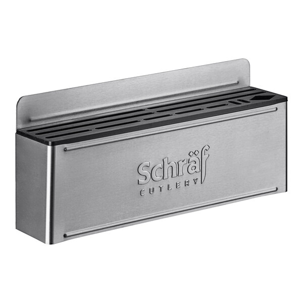 A stainless steel wall-mount knife rack with open slots.