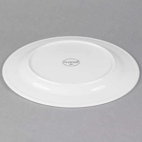 A white Libbey porcelain plate with a circular design on the rim.