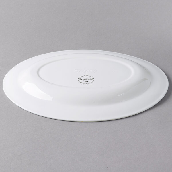 A white Libbey oval platter with a circular design on the rim.