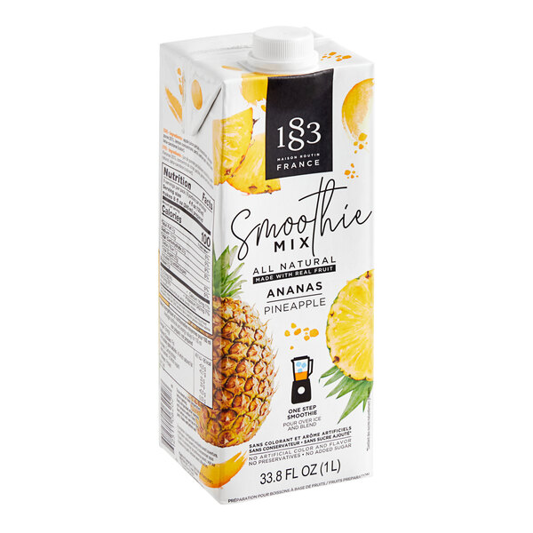 A white carton of 1883 Maison Routin Pineapple Smoothie Mix with a label featuring a pineapple.