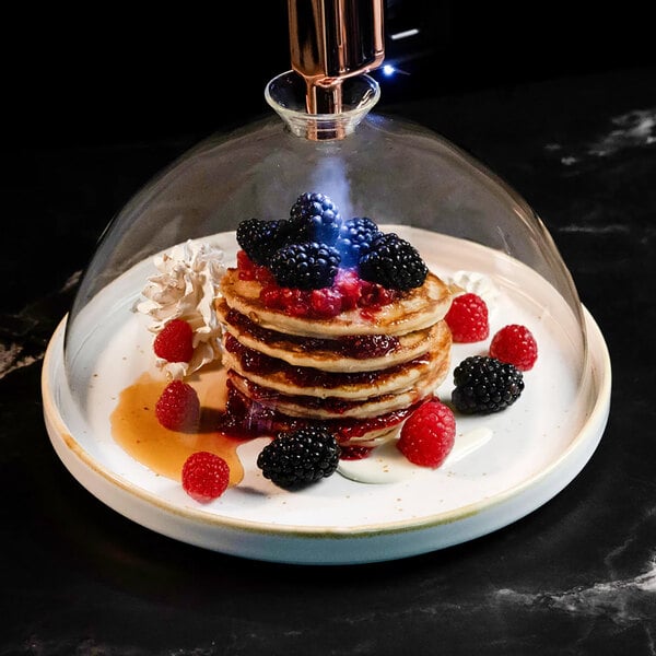 A stack of pancakes with berries in a Flavour Blaster Large Food Cloche.