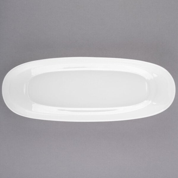 A white Libbey oval plate with a white border.