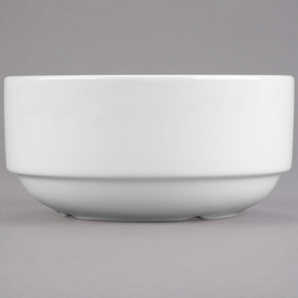 A white Libbey Slenda porcelain bouillon bowl with a plain bottom on a gray surface.