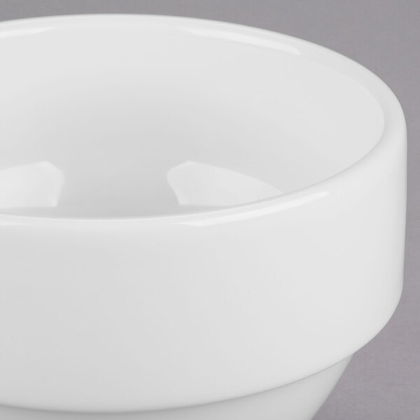 A close up of a Libbey Royal Rideau white porcelain bouillon bowl with a lid.