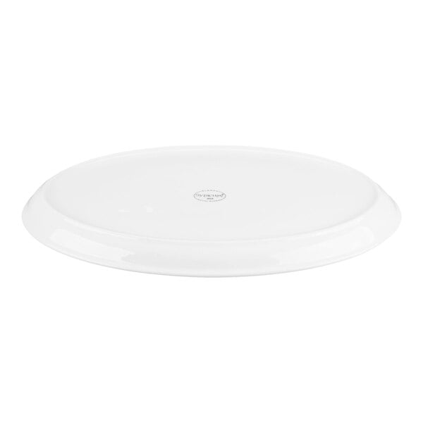 A white, oval-shaped porcelain tray with a slightly raised edge, shown from a low angle.