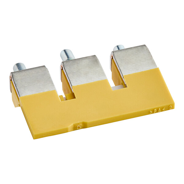 A Main Street Equipment 3-way bridge terminal with yellow and silver connectors.