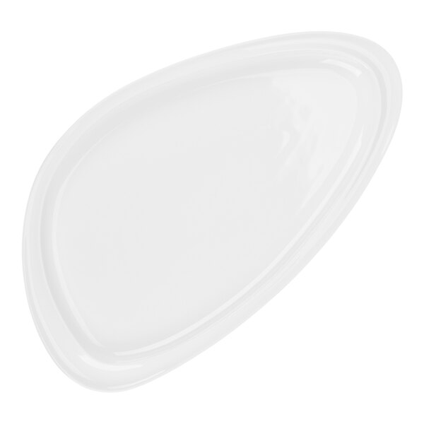 A white, asymmetrical porcelain plate with a smooth, modern design.