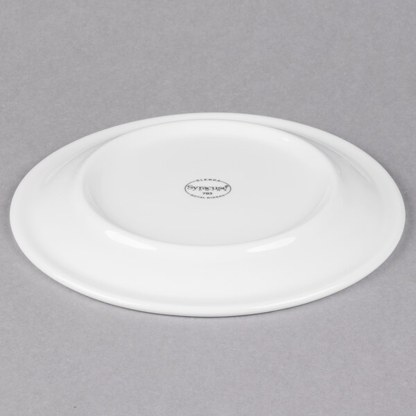 A white Libbey round porcelain plate with a narrow rim.