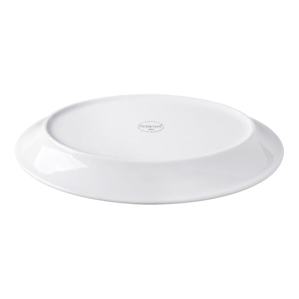 A white, oval-shaped porcelain platter shown upside down with a slightly raised foot and a smooth, glossy finish.