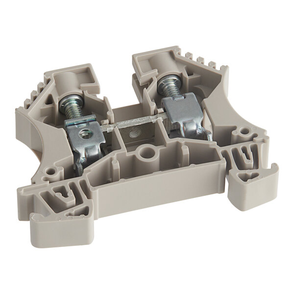 A grey plastic Noble Warewashing power terminal with metal connectors and screws.