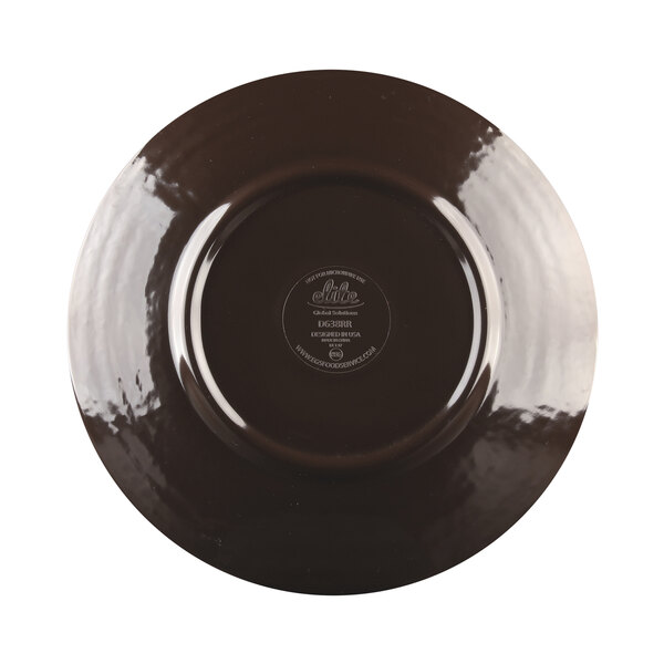 An aubergine-colored plate with a black rim.