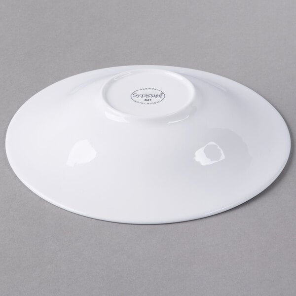 A white Libbey round coupe bowl on a gray surface.