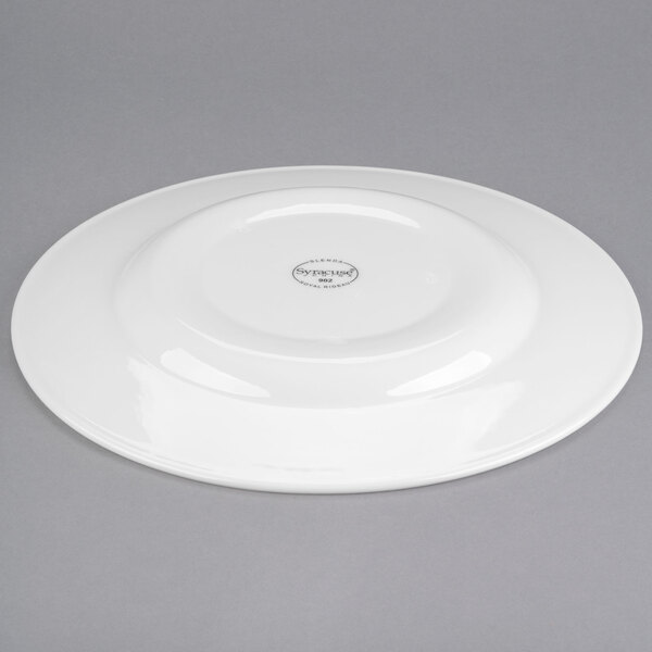 A Libbey white porcelain plate with a wide circular rim.