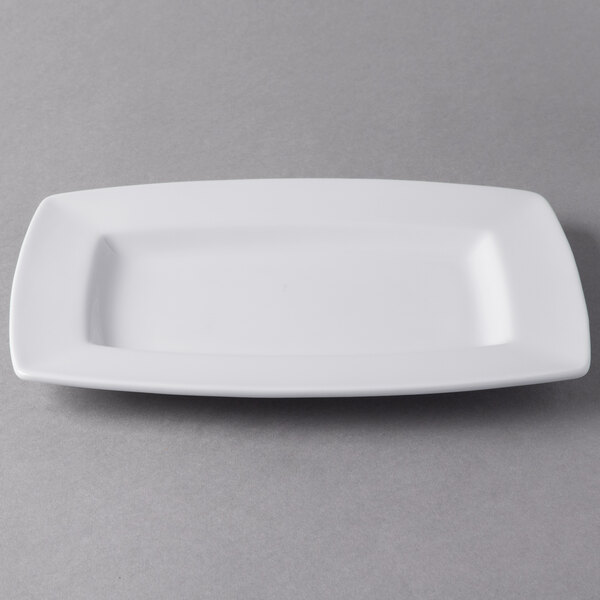 A white rectangular Libbey Slenda porcelain plate with a wide rim.