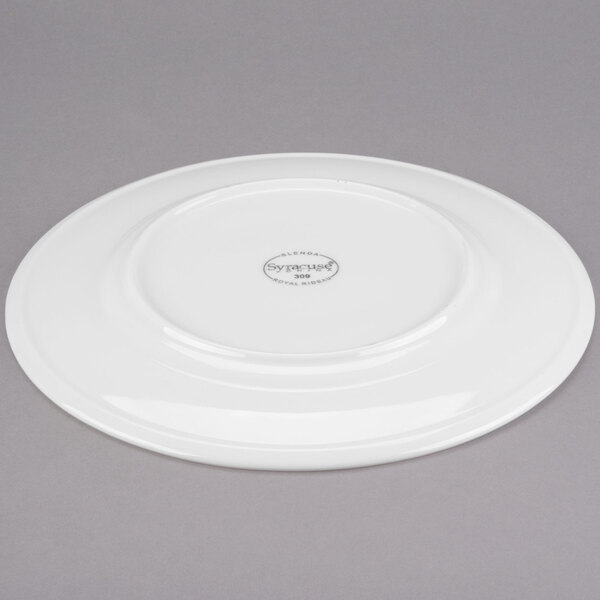 A white Libbey Slenda porcelain plate with a circular design on the rim.