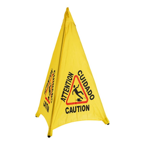 A yellow triangular caution sign that says "Caution Wet Floor" on a yellow cone.