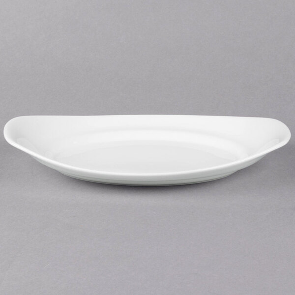 A white oval Libbey porcelain handle platter.