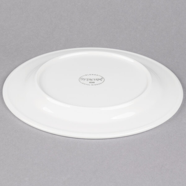 A Libbey white porcelain plate with a circular design on the rim.