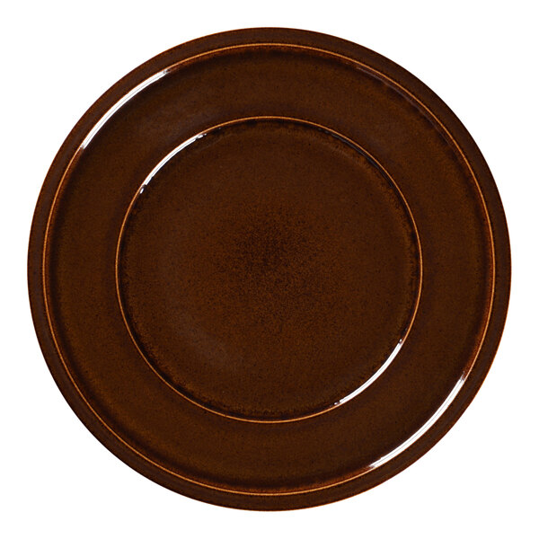 A brown porcelain plate with a rim on a white background.