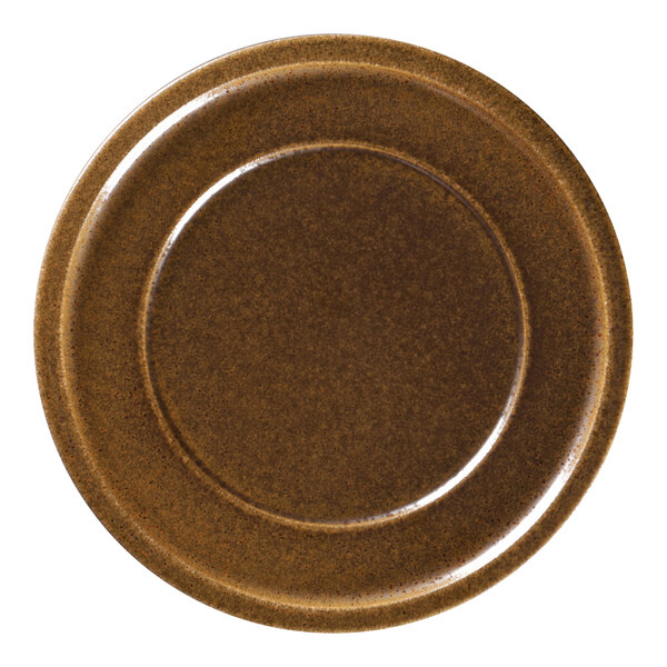 A brown porcelain plate with a brown rim.