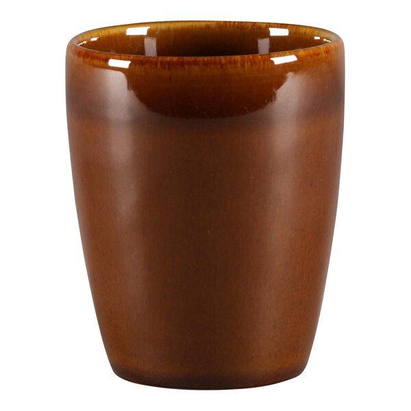 A brown porcelain coffee cup with a white rim and handle.