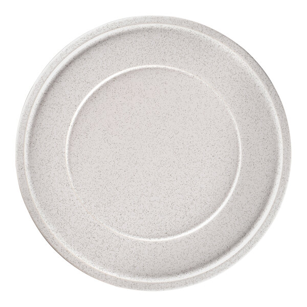 A white RAK Porcelain flat porcelain plate with a speckled rim.